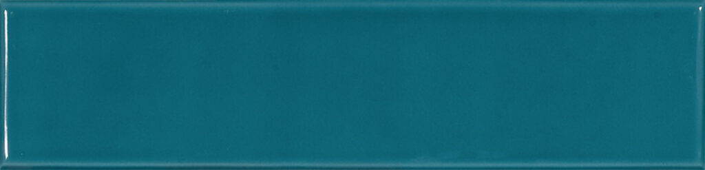 Green ceramic wall tile by Tile&Bath, 7.5x30cm, with a smooth glazed finish and subtle watercolor-inspired design.