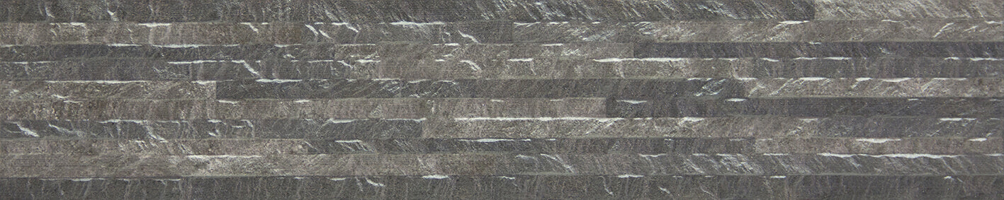 Lustrestone Grigio 10x49 porcelain wall tile from Tile&Bath, showcasing sleek gray rectangular tiles for modern interior walls.